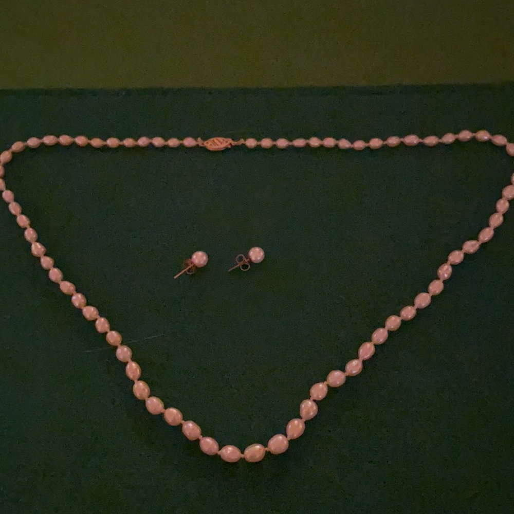 Hand knotted freshwater pearls purchased in Hong Kong. With earrings